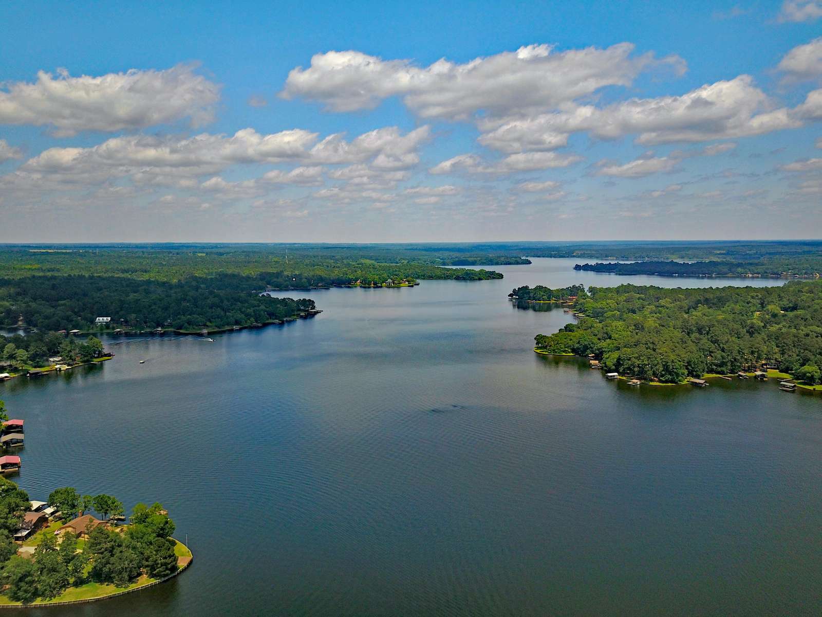 Located less 7/10th's (walk or drive) lies a gem of a spring fed lake. Bring a boat, there's a community boat launch.