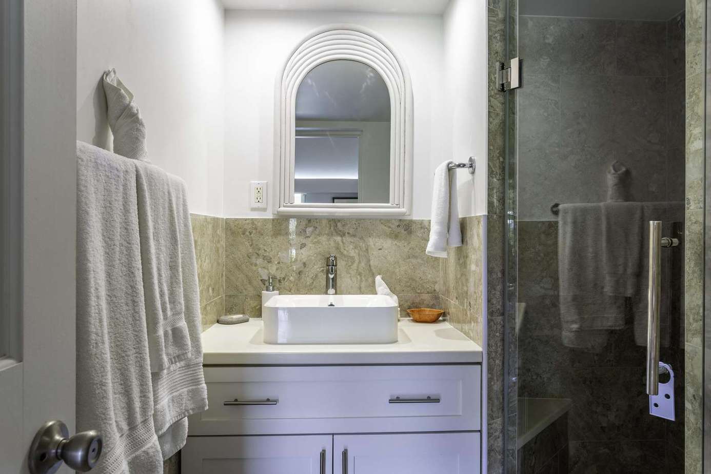 Bright and modern bathroom with sleek glass shower