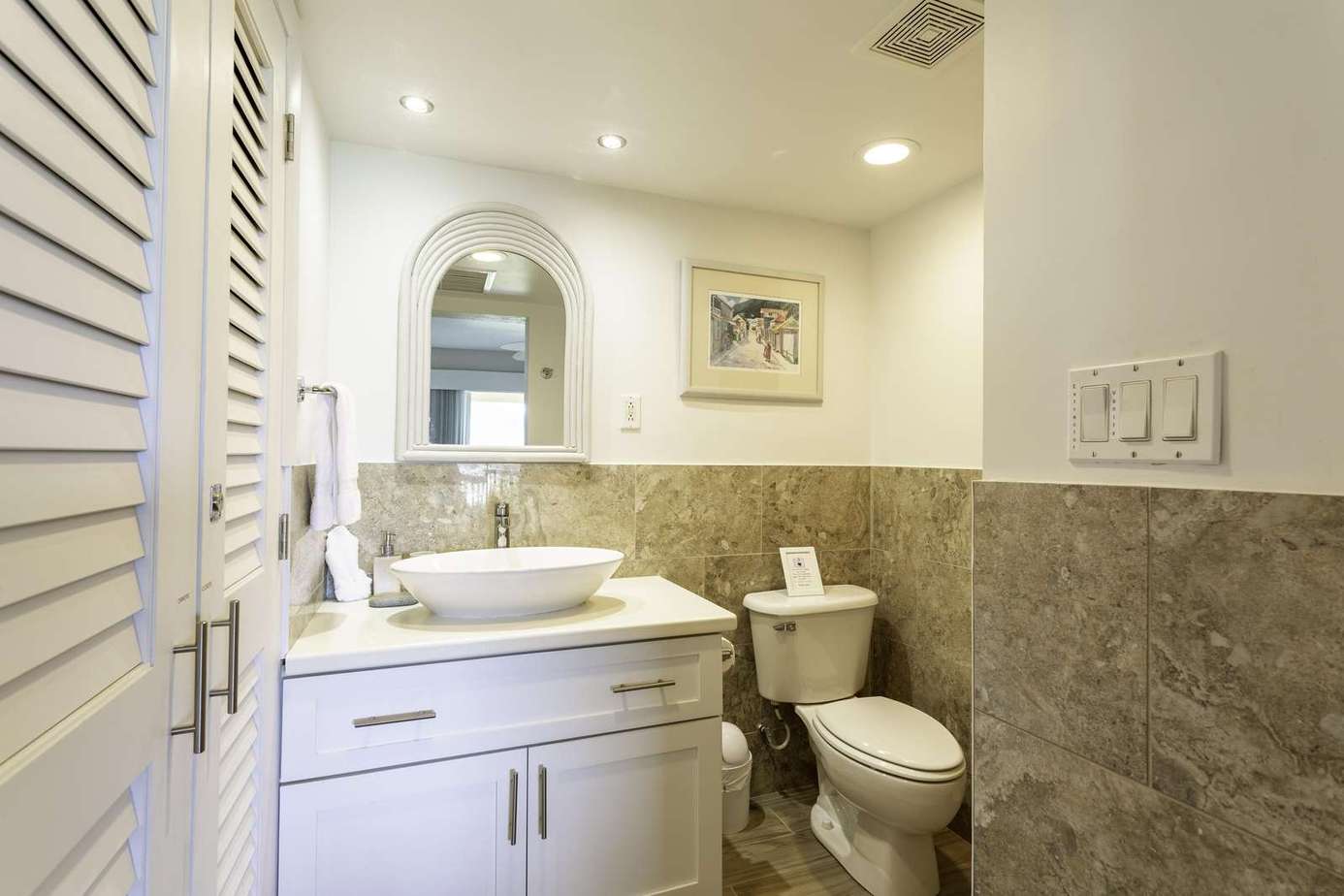 Bright and modern bathroom with elegant stone accents