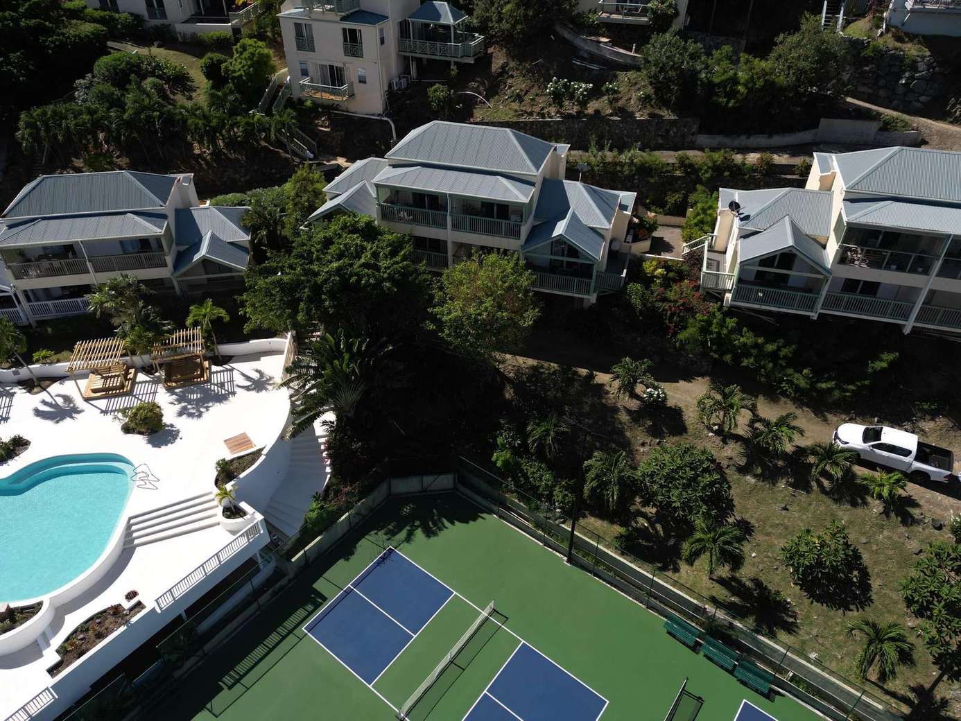 Spacious outdoor retreat with pool and tennis courts