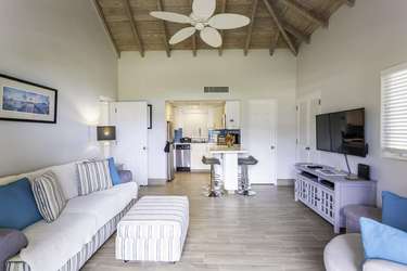 Airy living room with vaulted ceilings and cozy seating