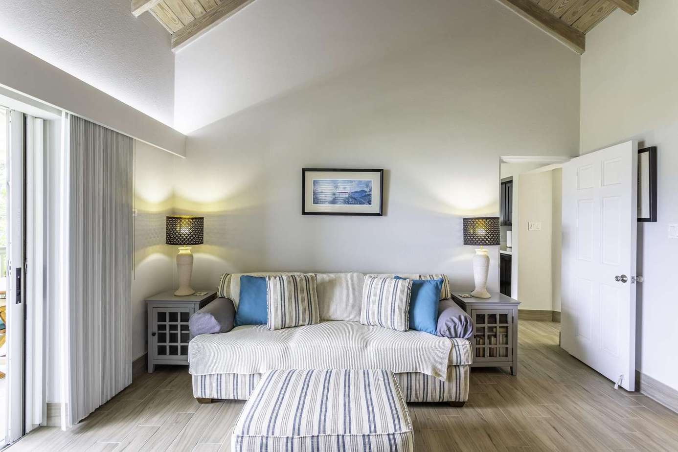 Cozy living room with vaulted ceilings and serene decor