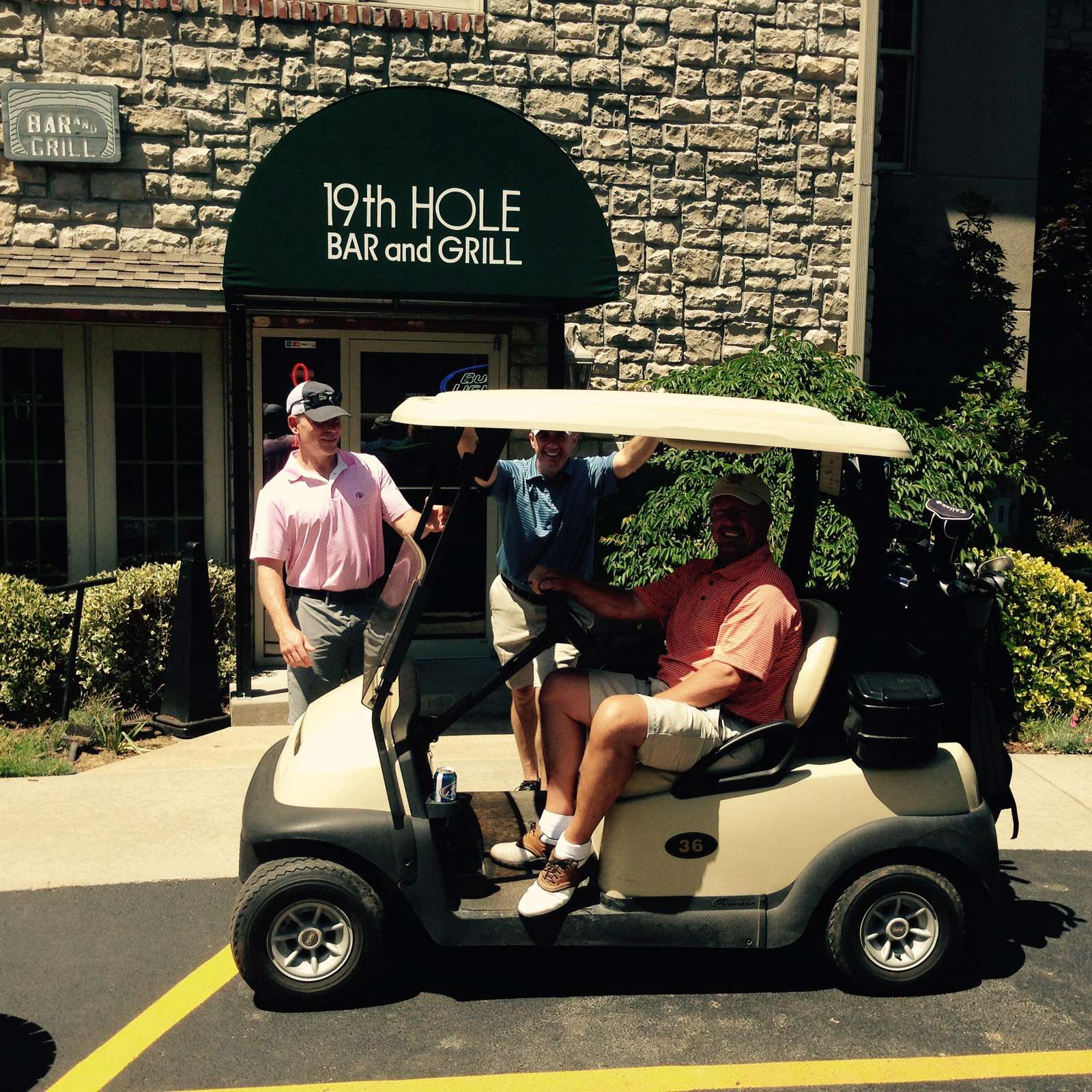 Happy Golfers after a quick lunch at the '19th Hole' Bar and Grill in the Clubhouse!