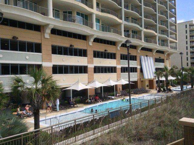 Outdoor pool with seating