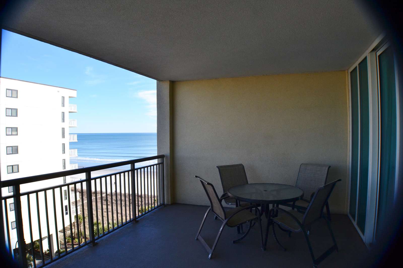 Spacious balcony with sunrise and ocean views