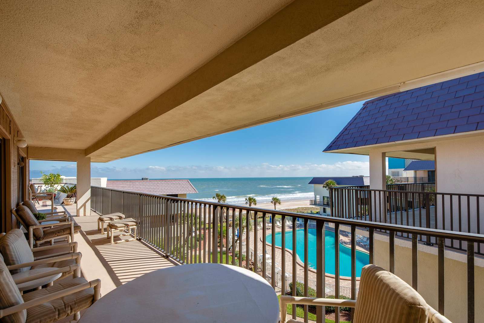 Covered deck, a great place for breakfast, reading & relaxing