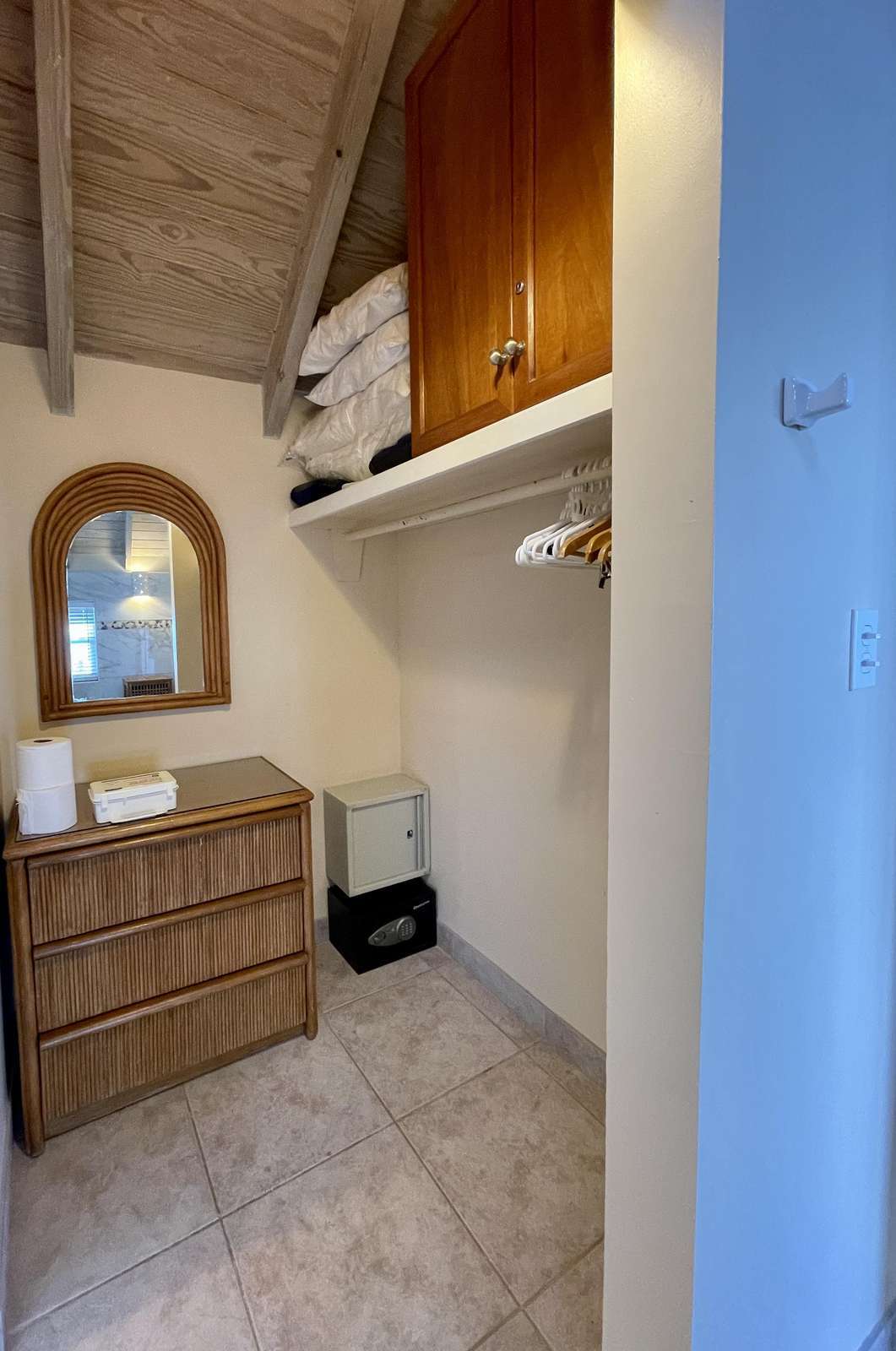 Cozy laundry nook with rustic wooden accents and natural light