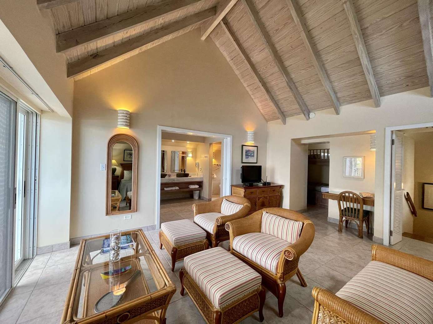 Airy living room with vaulted ceilings and cozy seating