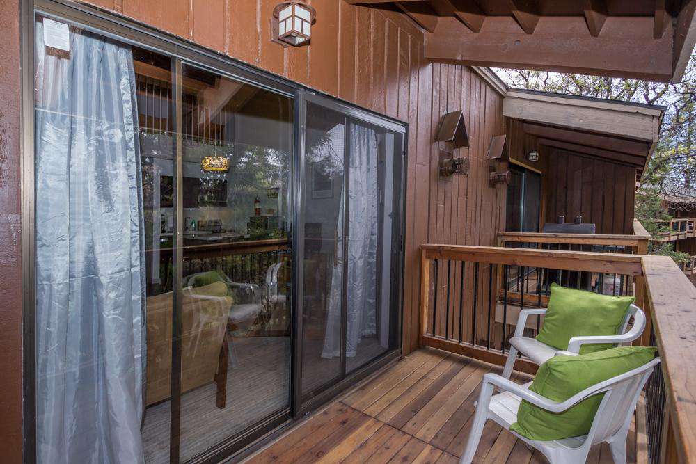 The deck with seating and electric grill.