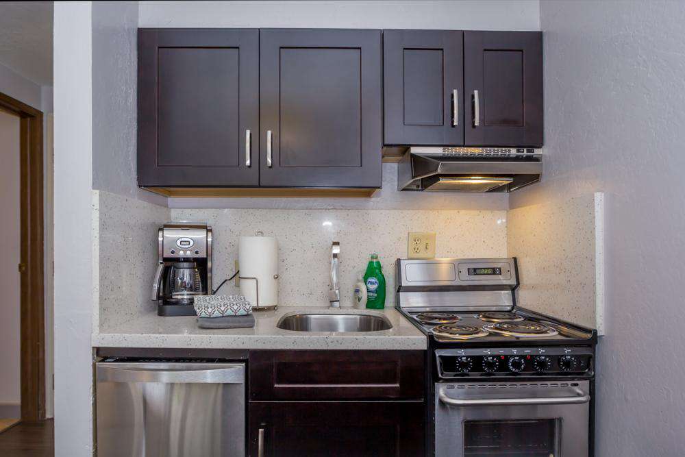 Your fully equipped kitchen with stove top oven, dishwasher, mircrowave, toaster & coffee maker.