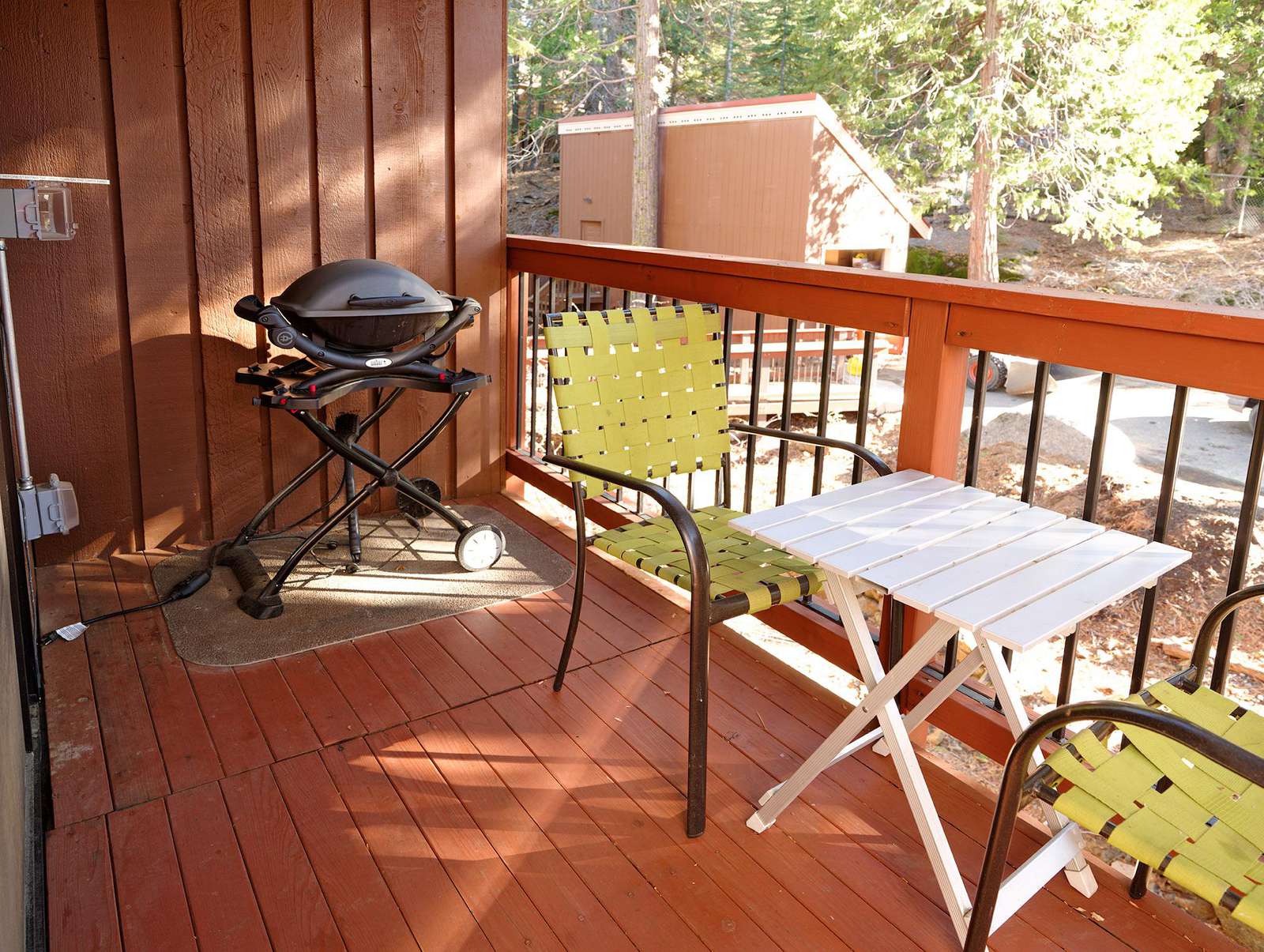 Your private balcony with seating and electric grill.