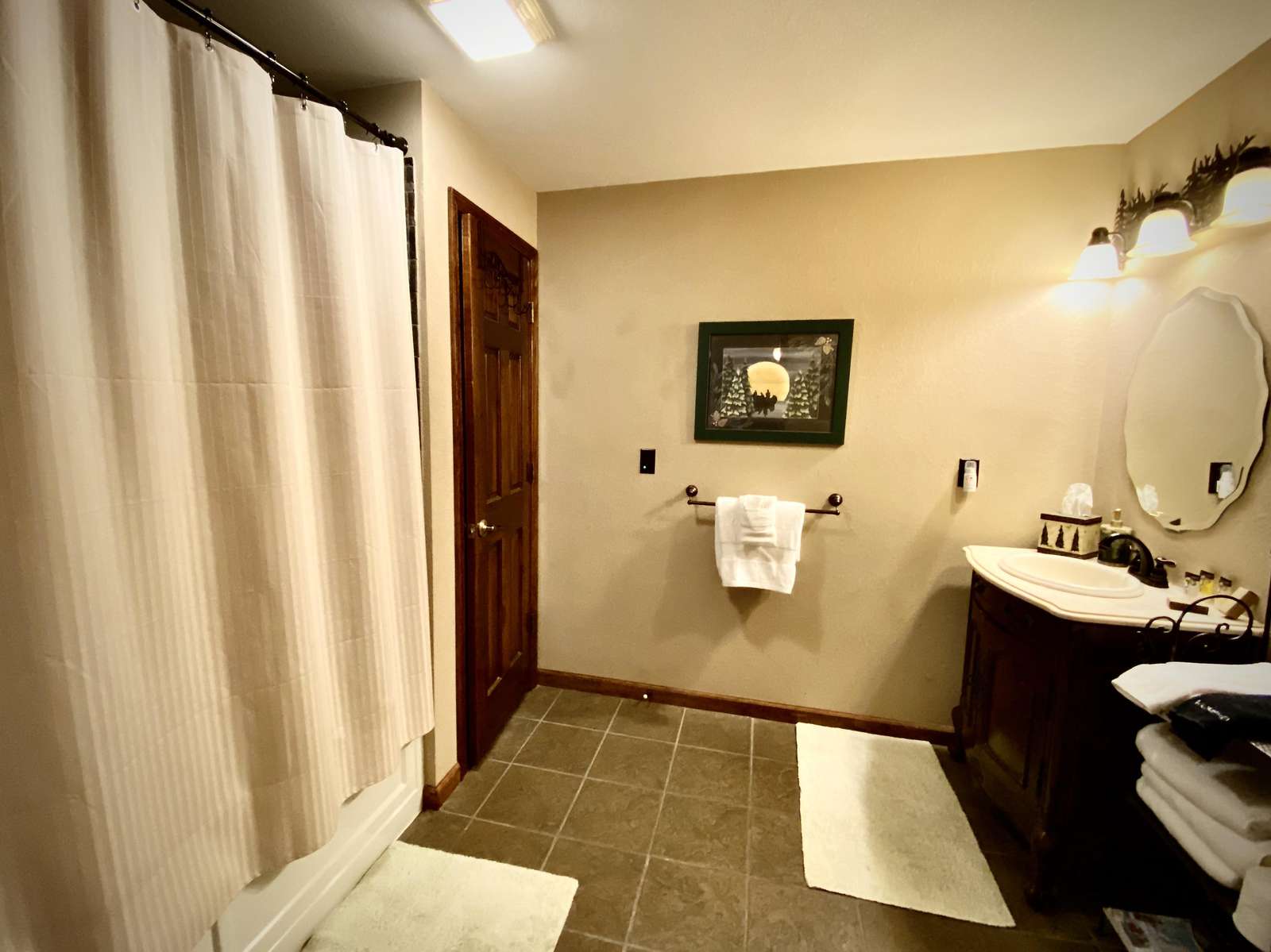 One of 3 Full Bathrooms (Master Bathroom offers a Jetted Tub)