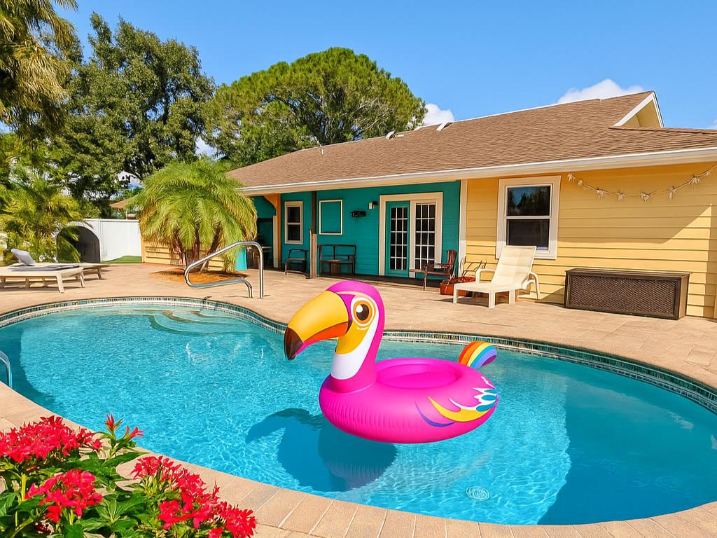 Sunny backyard with private pool and vibrant lounge area