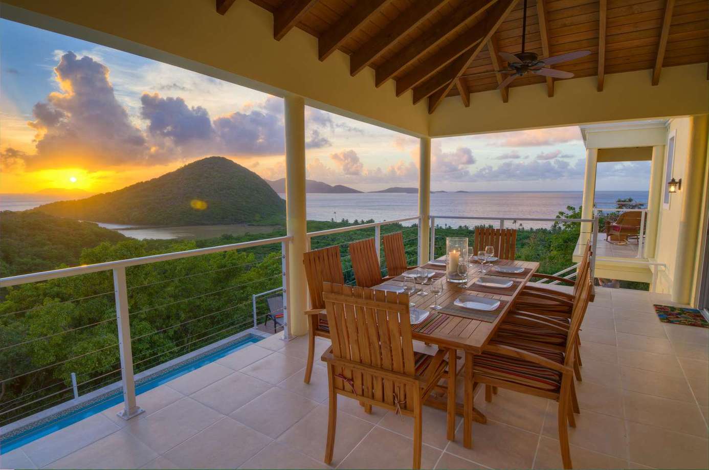 Sunset dining with panoramic mountain and ocean views on the patio