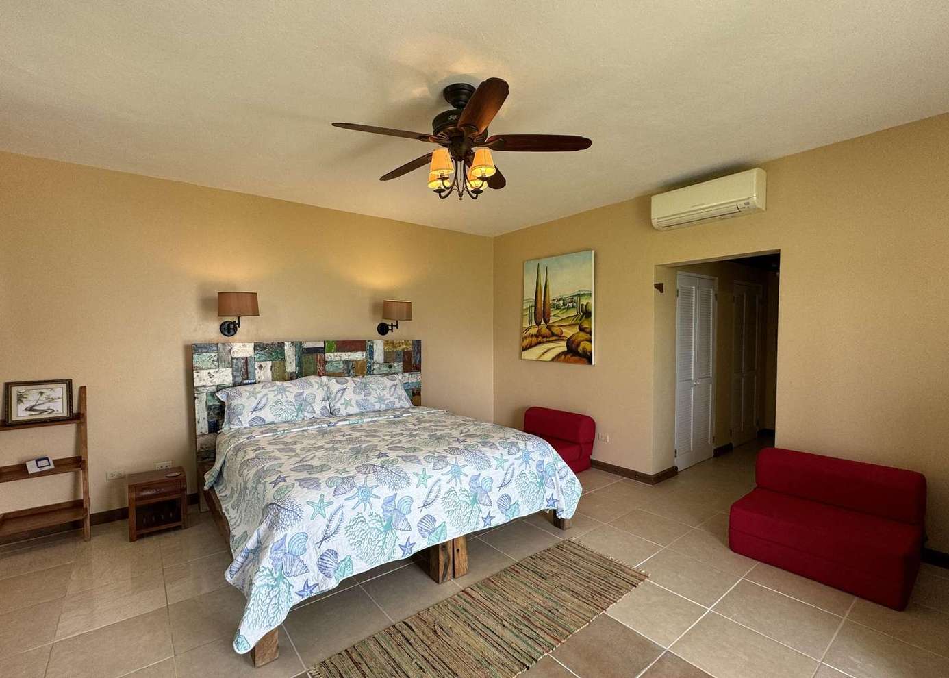 Spacious bedroom with cozy bed and calming earth tones