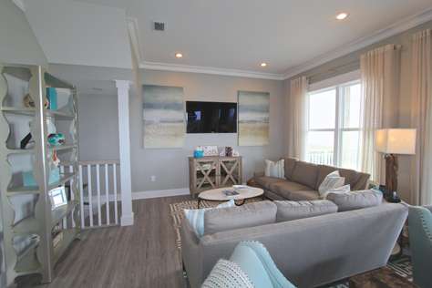 Gulf front family room with deck access