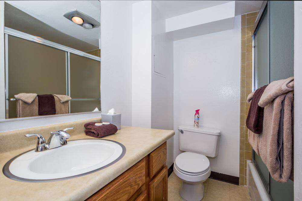 One of your two bathrooms (downstairs). Both bathrooms have a shower/tub.