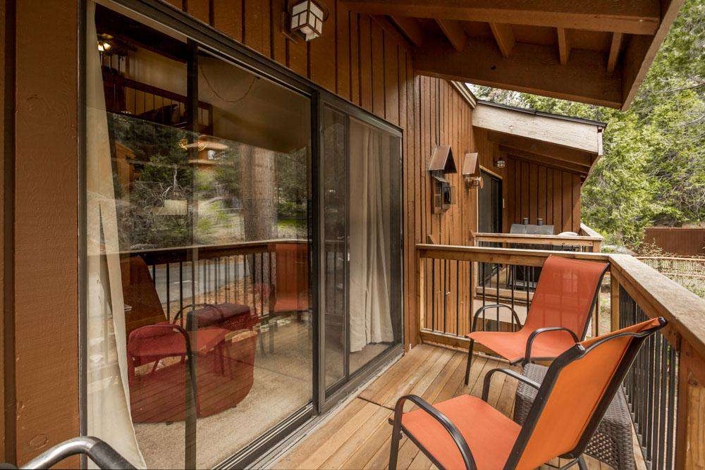 Your private deck with seating and electric grill.