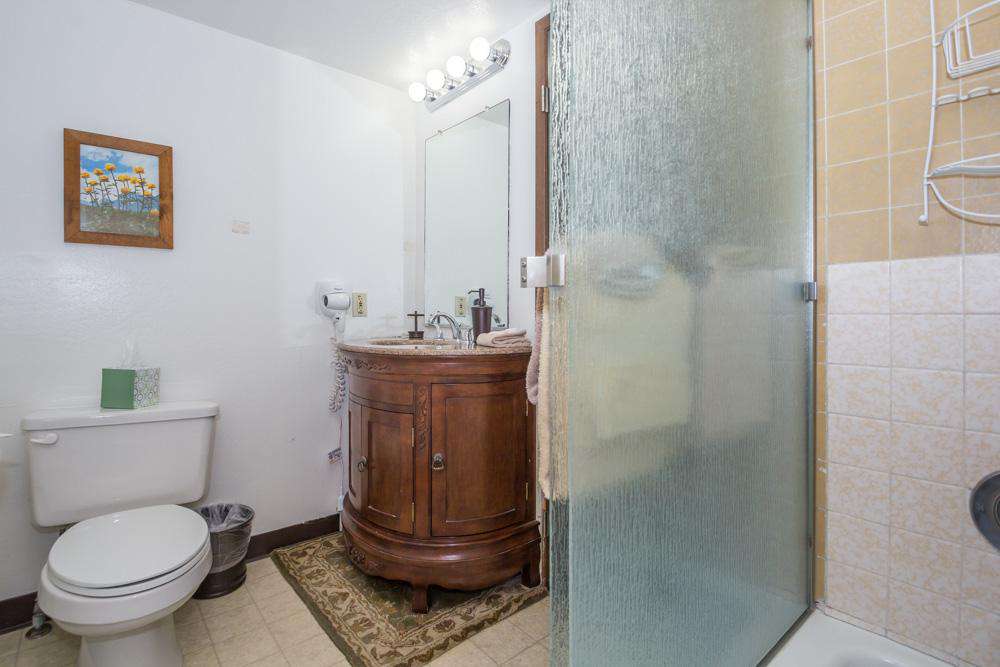 Upstairs bathroom with shower tub.