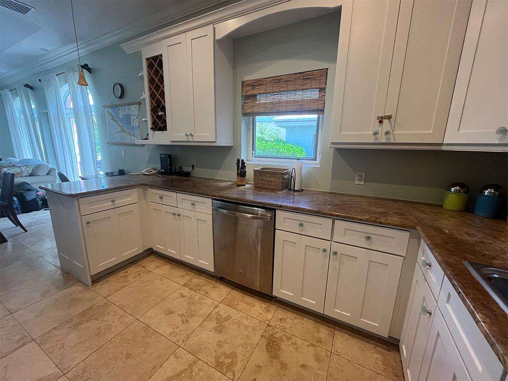 Bright, spacious kitchen with modern appliances and cozy dining nook