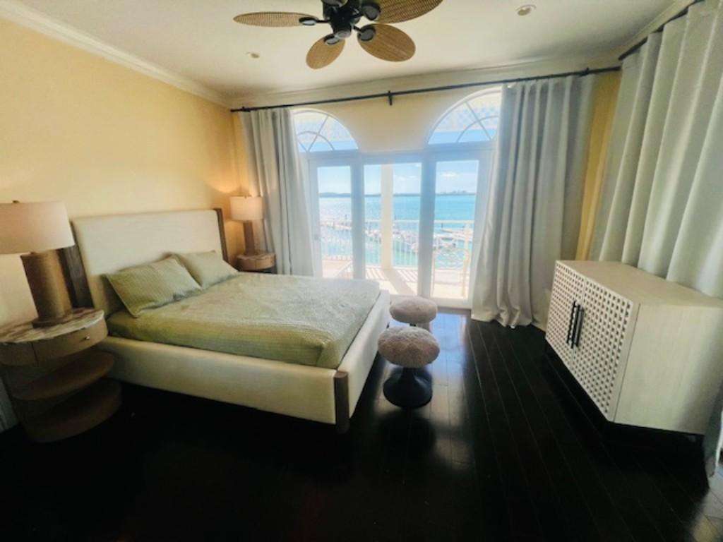 Cozy bedroom with ocean views and soothing natural light