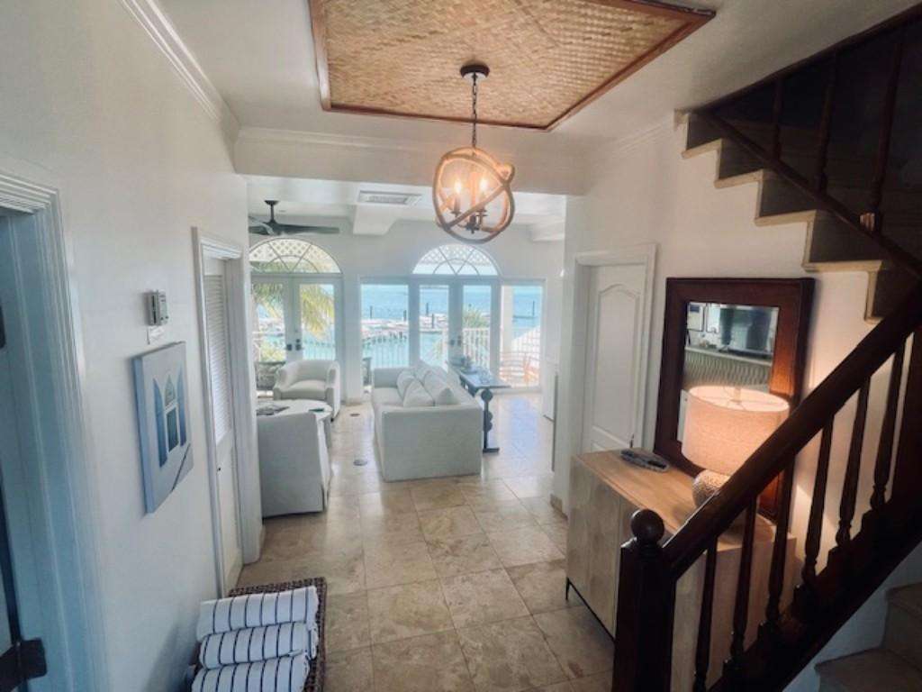 Bright living area with ocean views and cozy seating