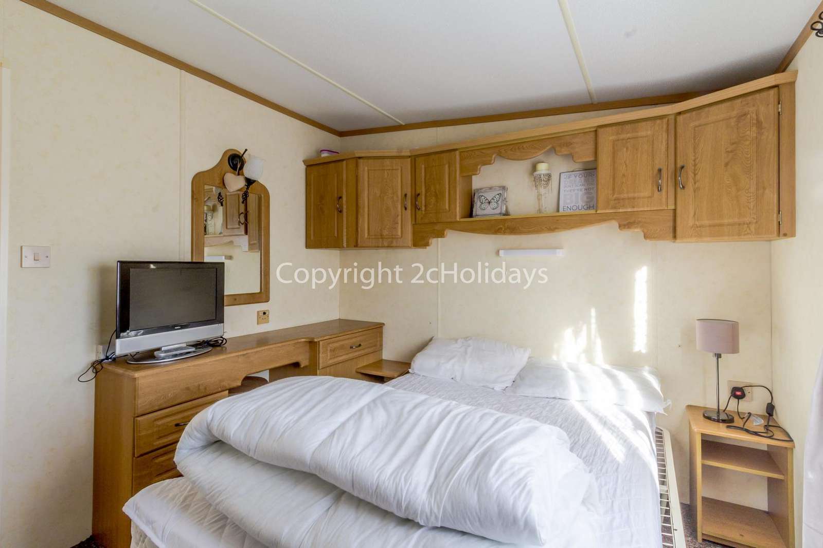You can find plenty of storage space in this Master bedroom