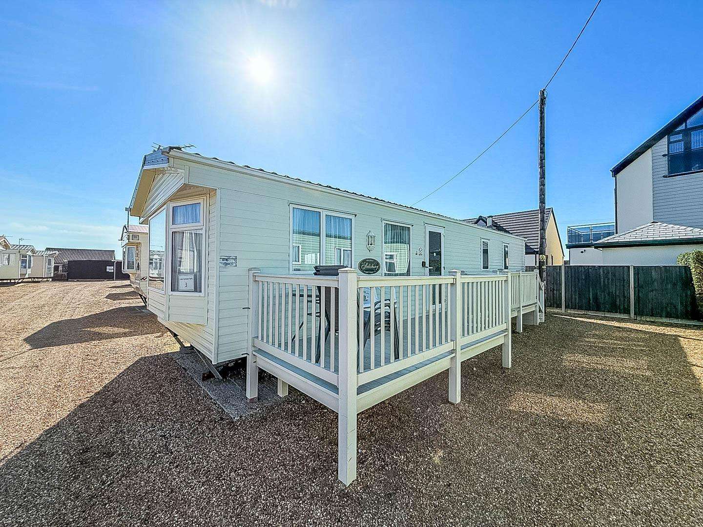 Elevate your holiday experience by choosing this 8 berth caravan with decking at Lee’s Caravan Park. The outdoor area becomes your own personal space, perfect for enjoying a morning coffee or unwinding with a glass of wine as the sun sets. - property