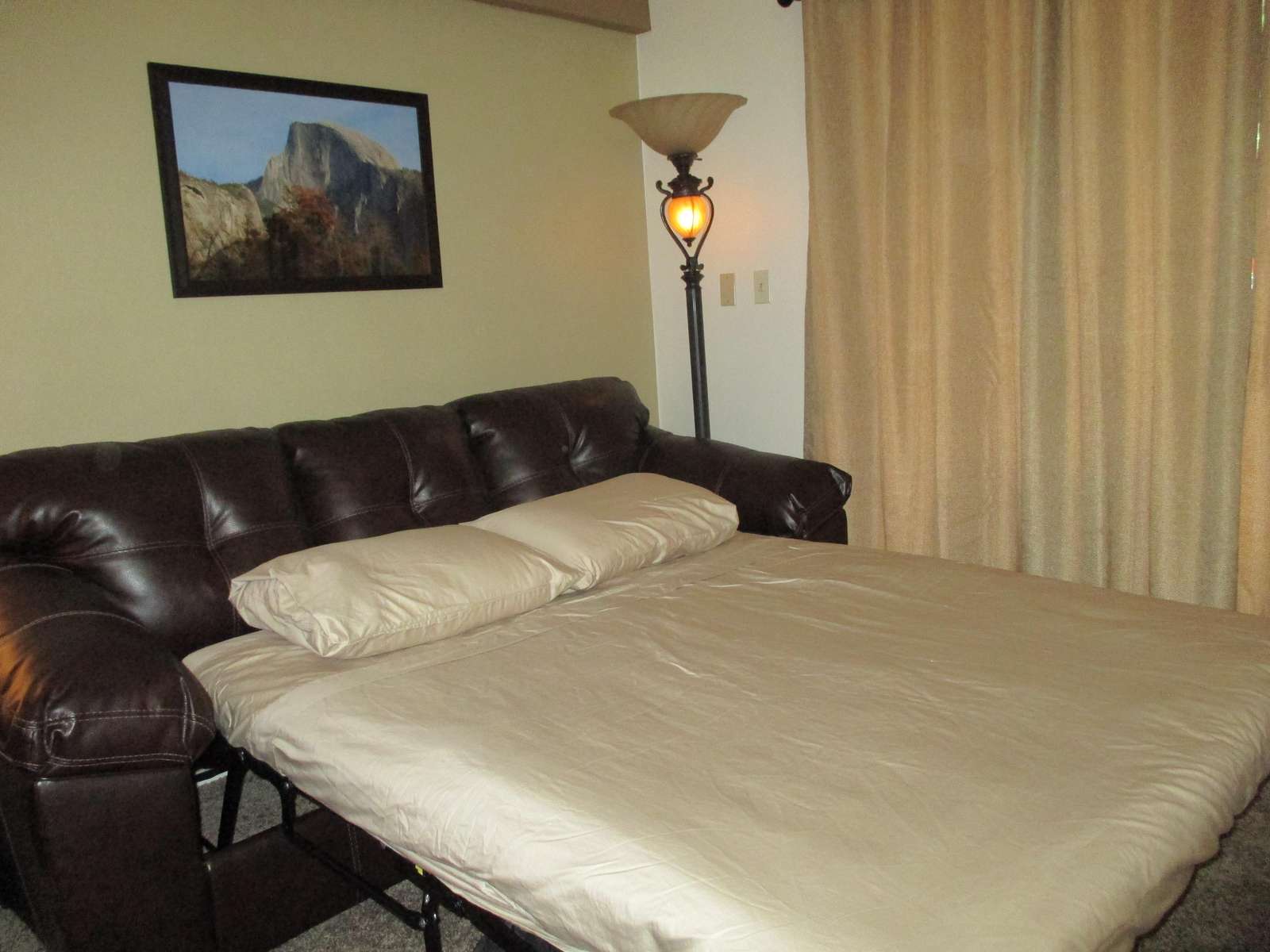 Your queen size sofa sleeper converts into a bed.