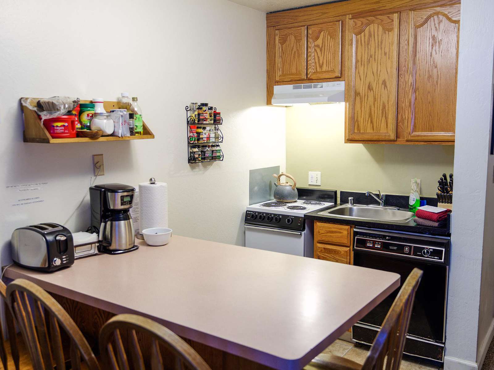 Your fully equipped kitchen includes dishes, pots & pans, dishwasher, stove-top oven and microwave.