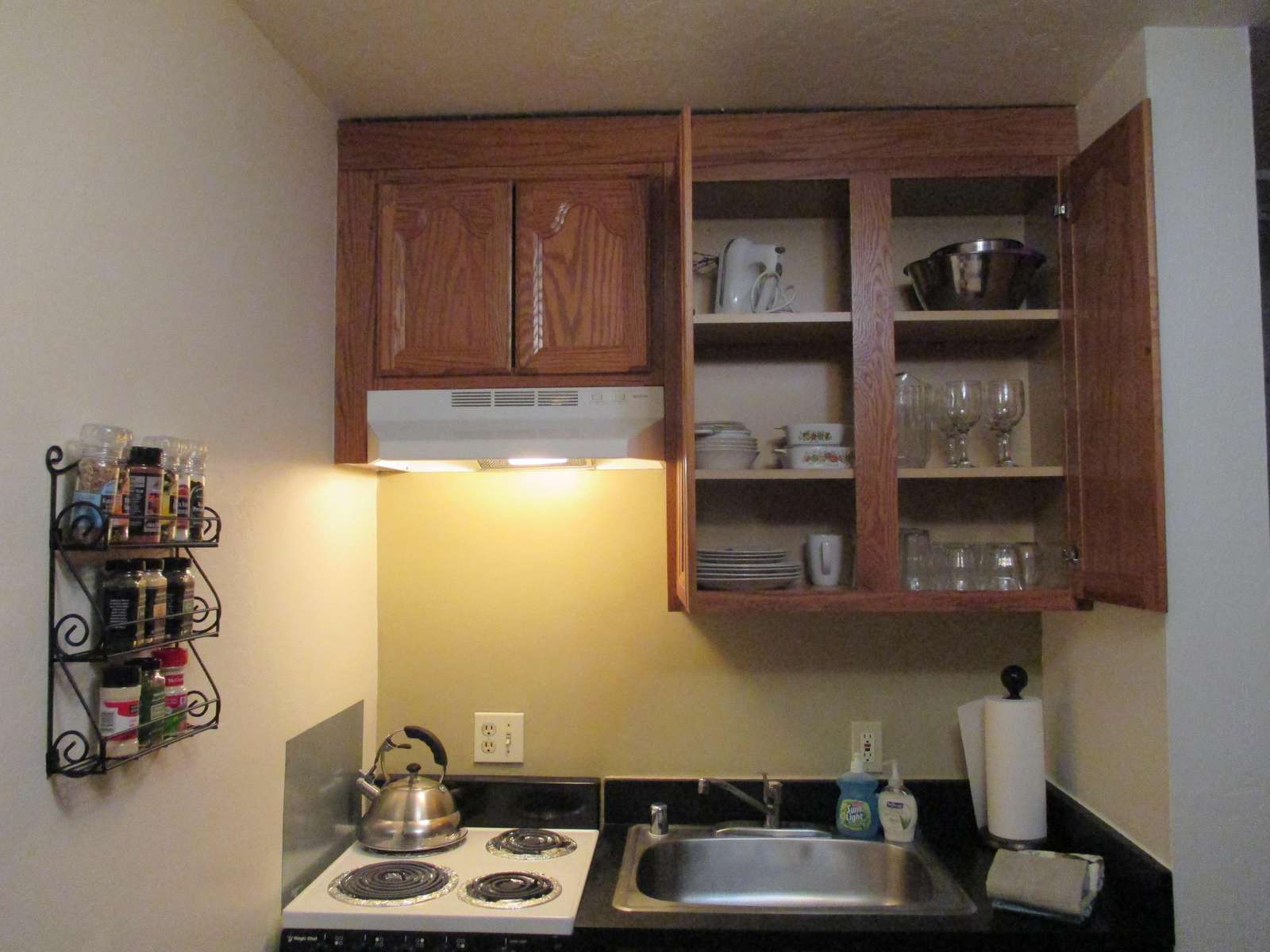 Dishes, pots & pans, utensils, spices, coffees, paper products, foil and plastic wrap all provided.