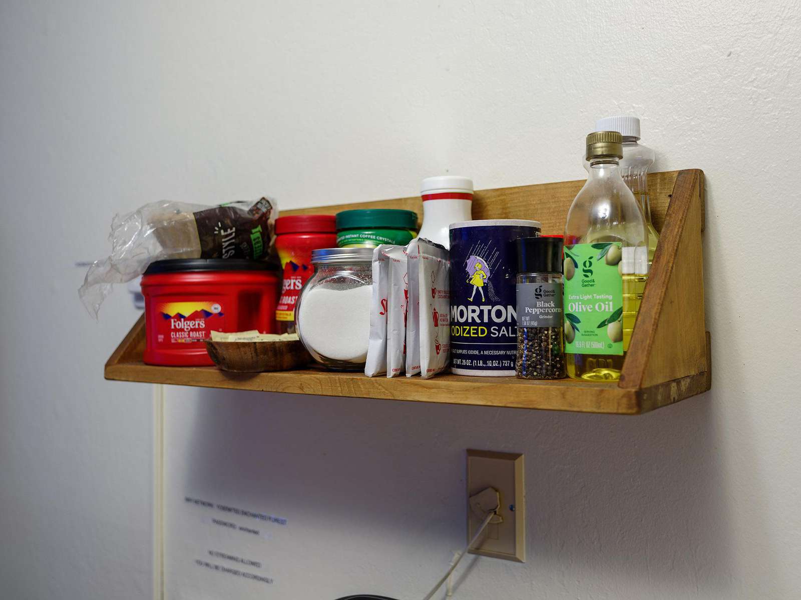 Kitchen includes coffee, sugars, filters, cooking oil.