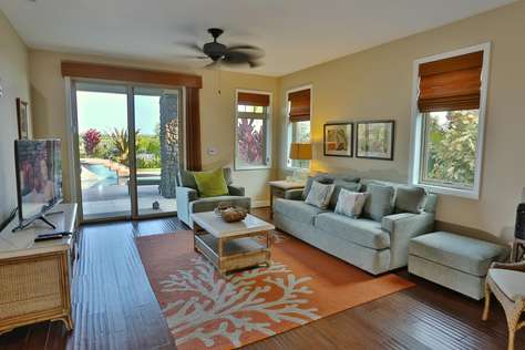 Downstairs family room opens up onto the pool area