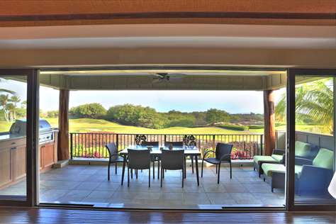 View out to the lanai, golf course and ocean