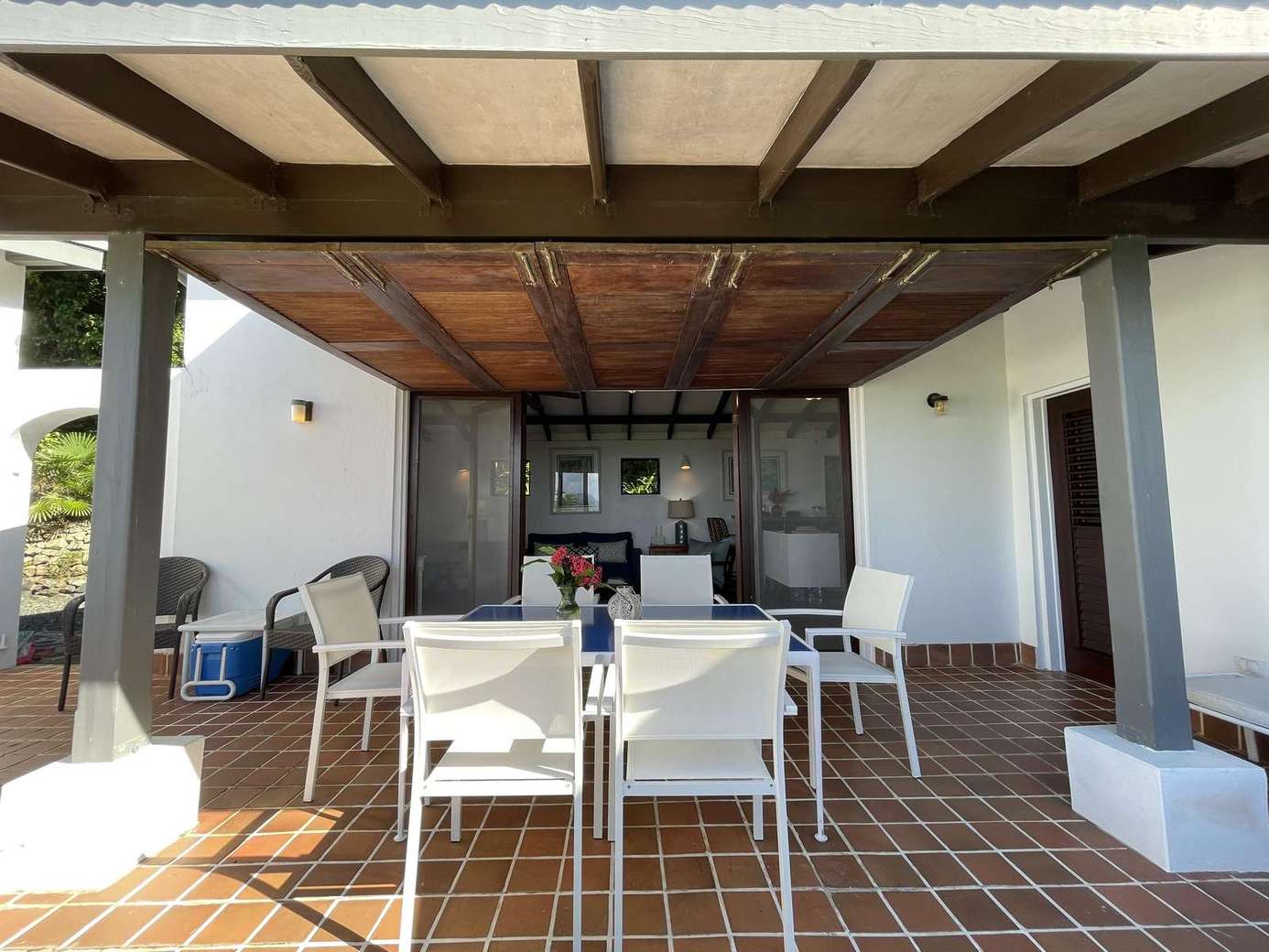 Spacious covered patio with dining and lounge seating for gatherings