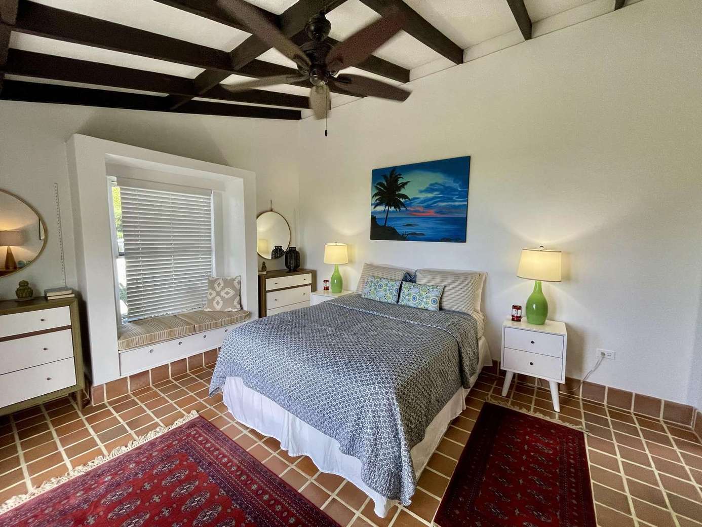 Cozy bedroom with vaulted ceilings and rustic charm