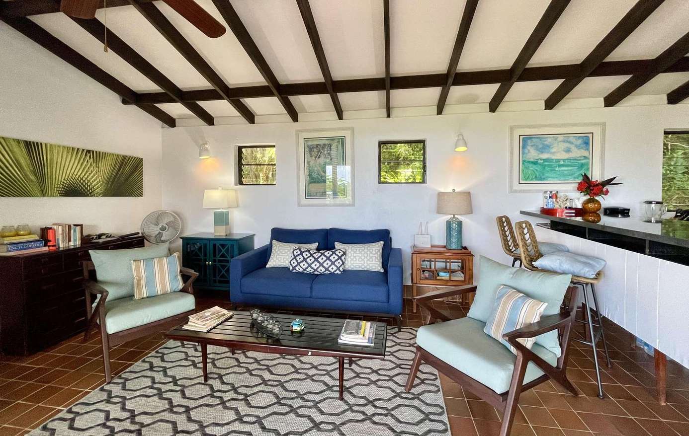Cozy living room with vaulted beams and vibrant accents
