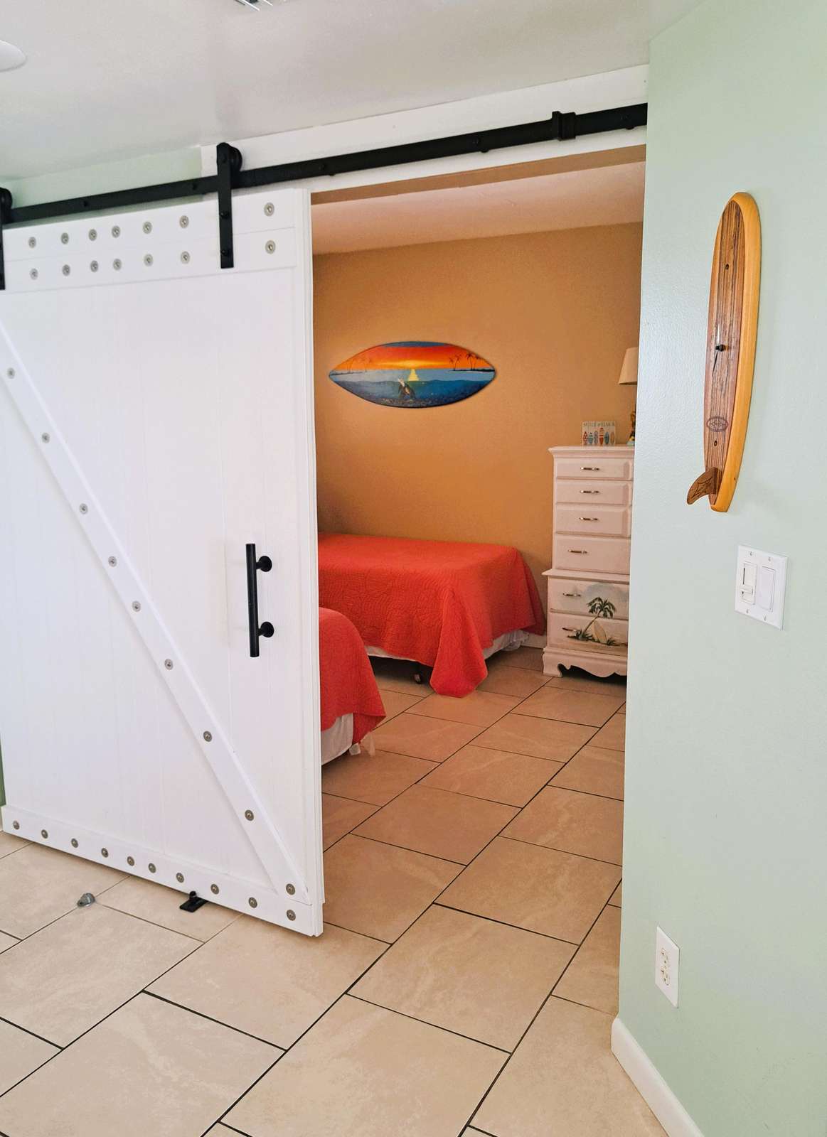 Barn door to guest bedroom