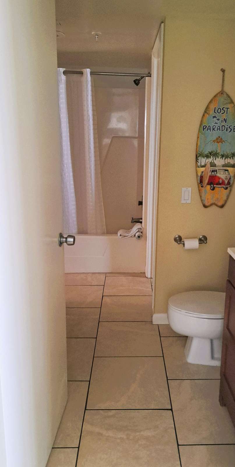 Guest bathroom has tub/shower