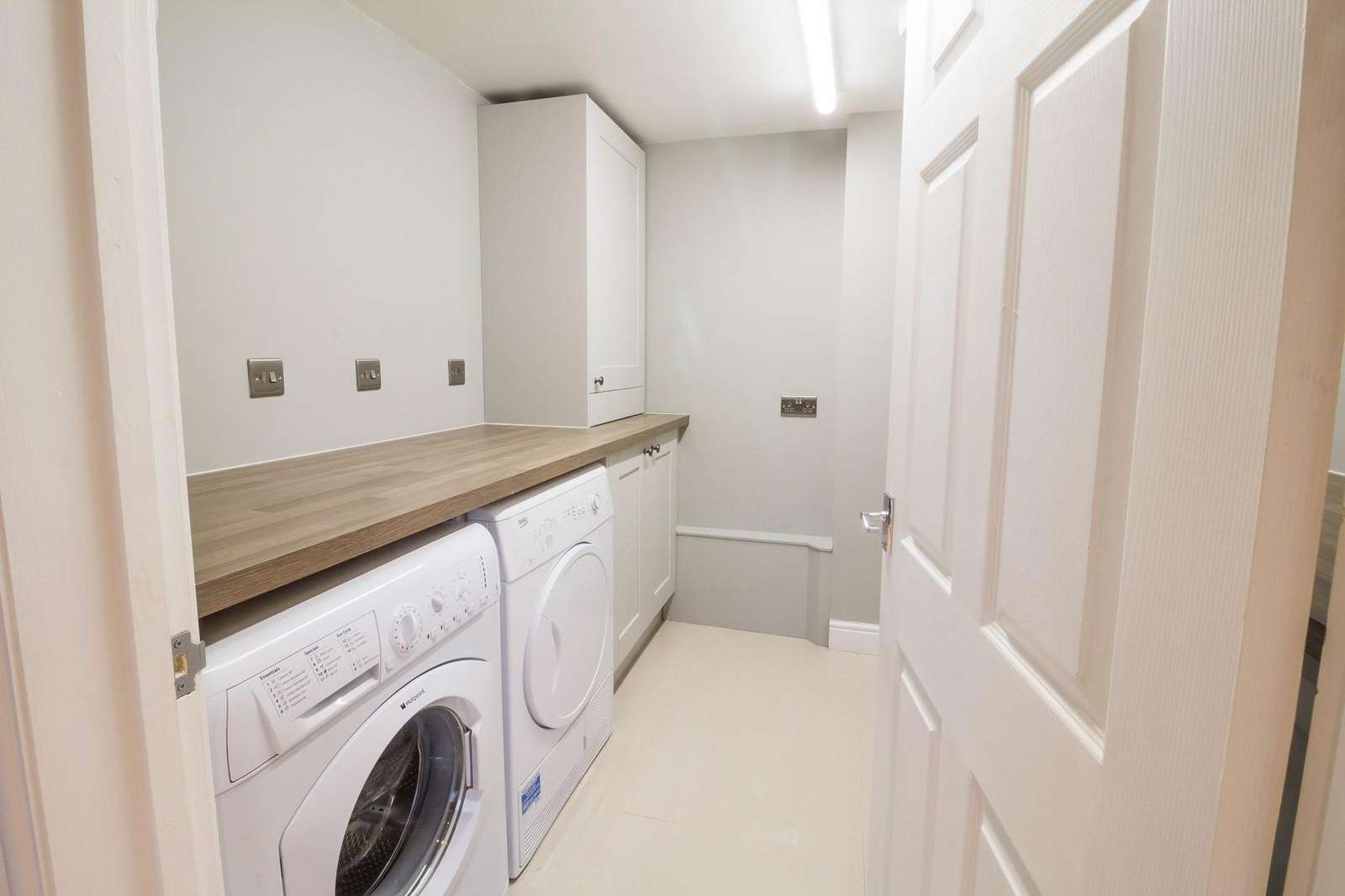 Great storage space in this utility room