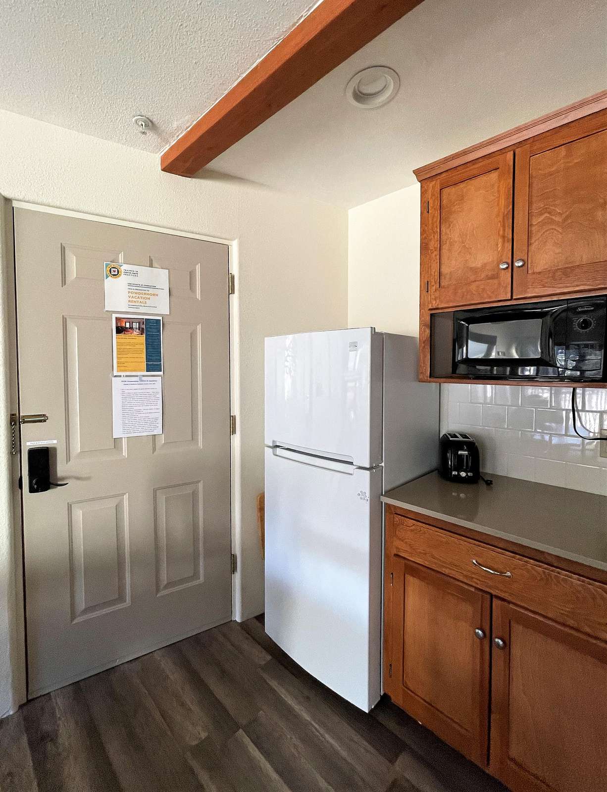 Condo Entrance Area inside with kitchen part 1