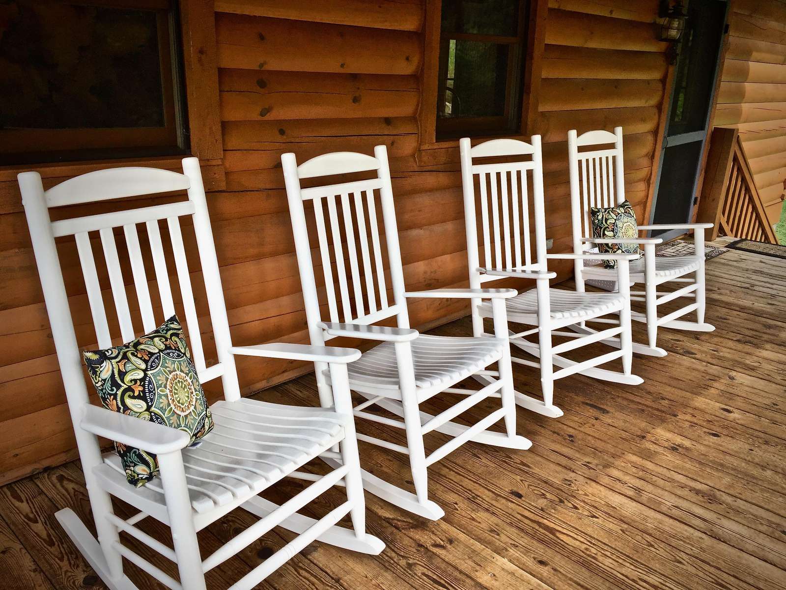 Old fashioned Rocking Chairs, and two Spacious Covered Decks to enjoy the outdoors rain or shine!