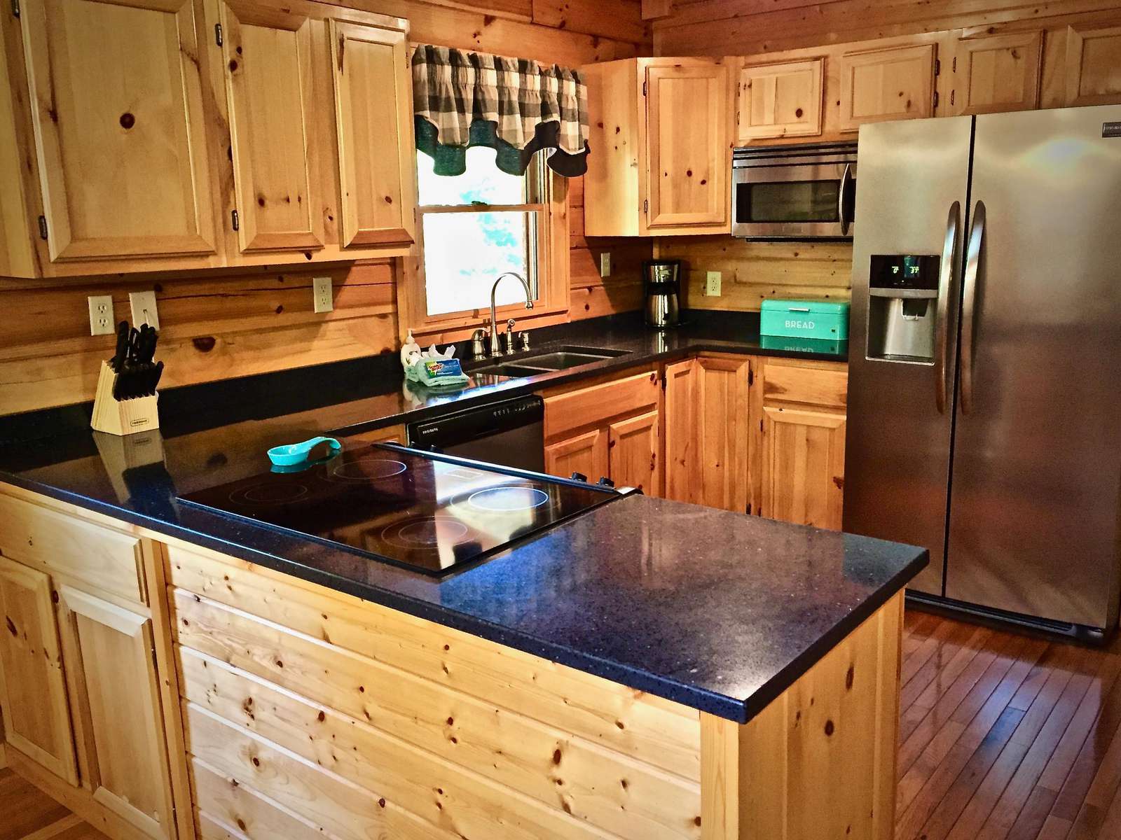 Kitchen is fully stocked and the Granite counter tops offer ample space to Prepare your Meals!