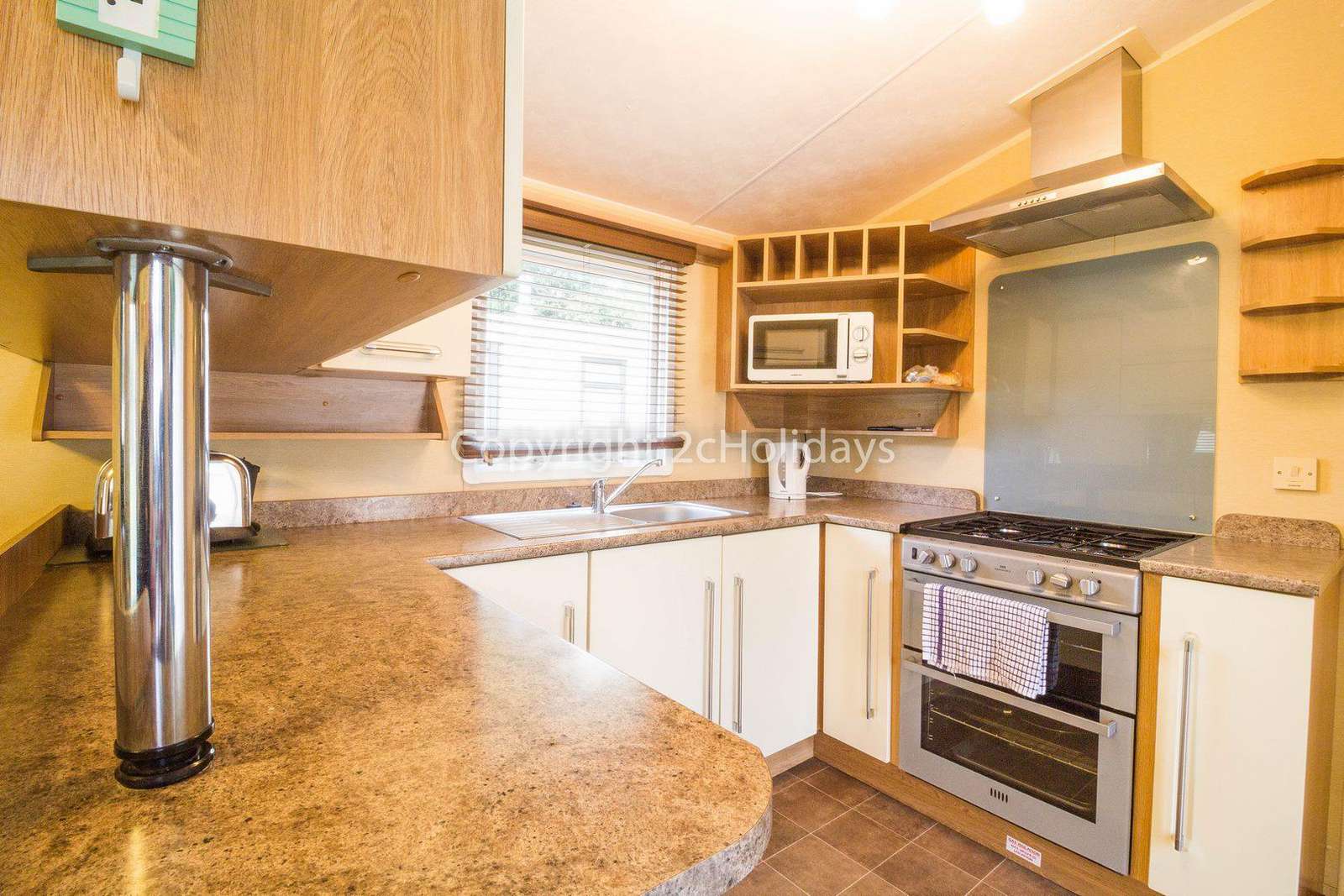 Modern and Stylish kitchen in this 8 berth luxury caravan at the Wild Duck Holiday Park.