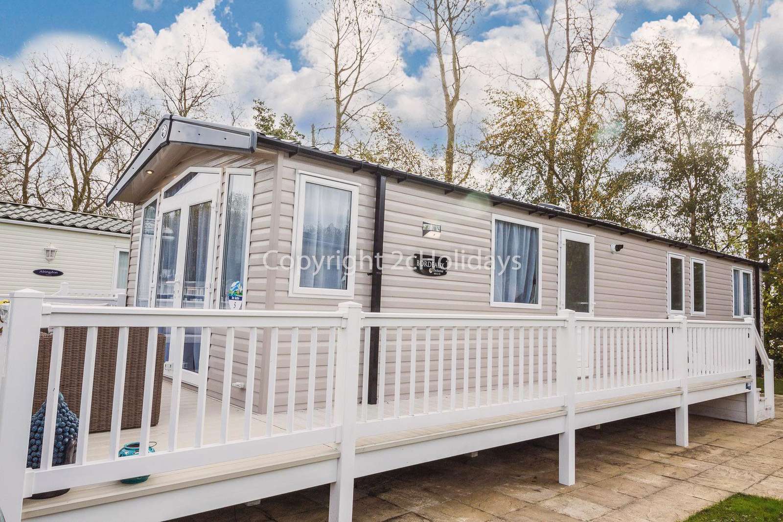 8 berth accommodation with decking at Hopton Holiday Village