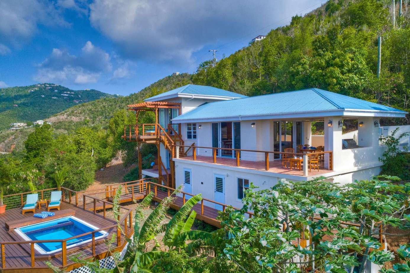 Spacious hillside retreat with panoramic mountain views and pool