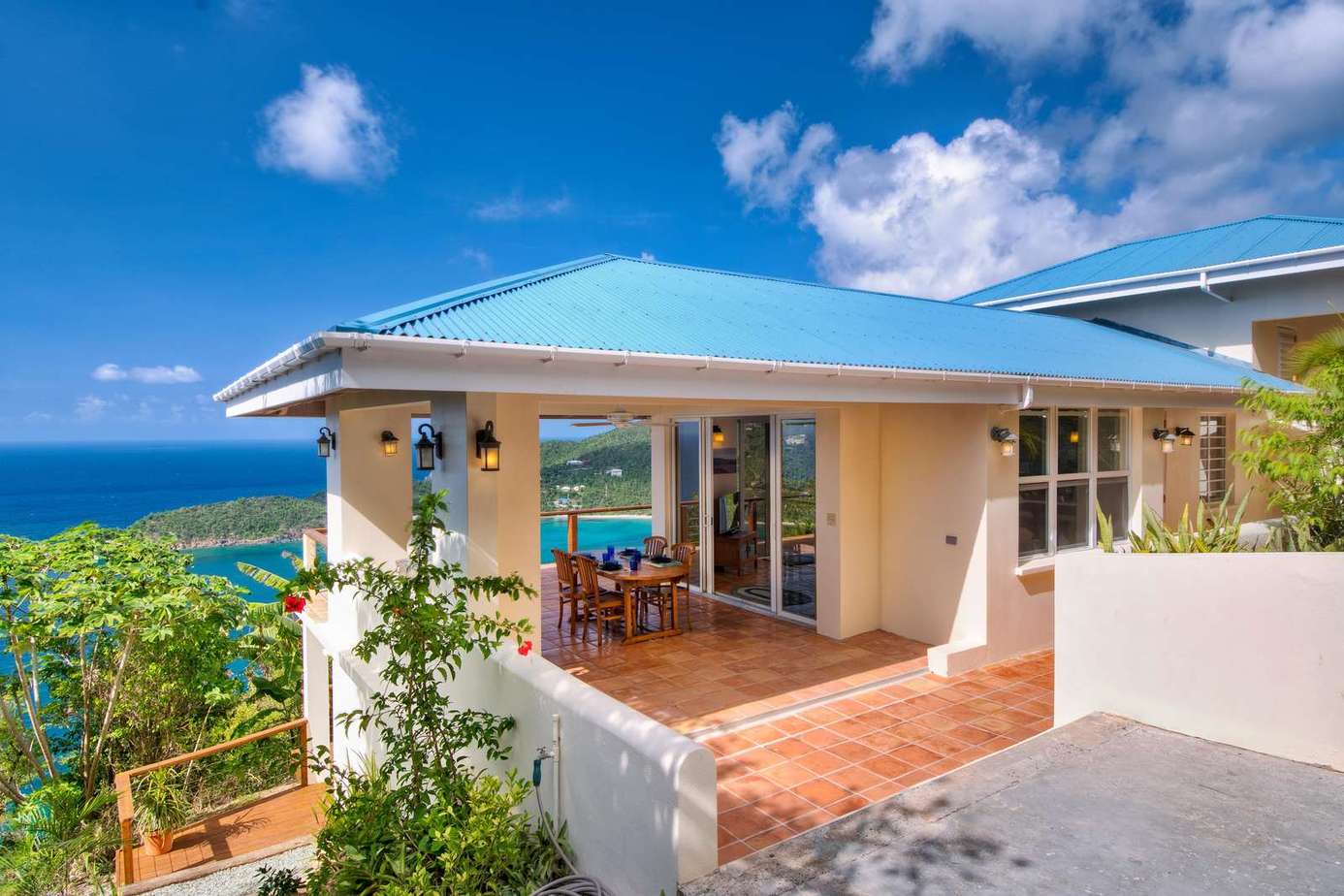 Sunlit patio with ocean views for serene mornings