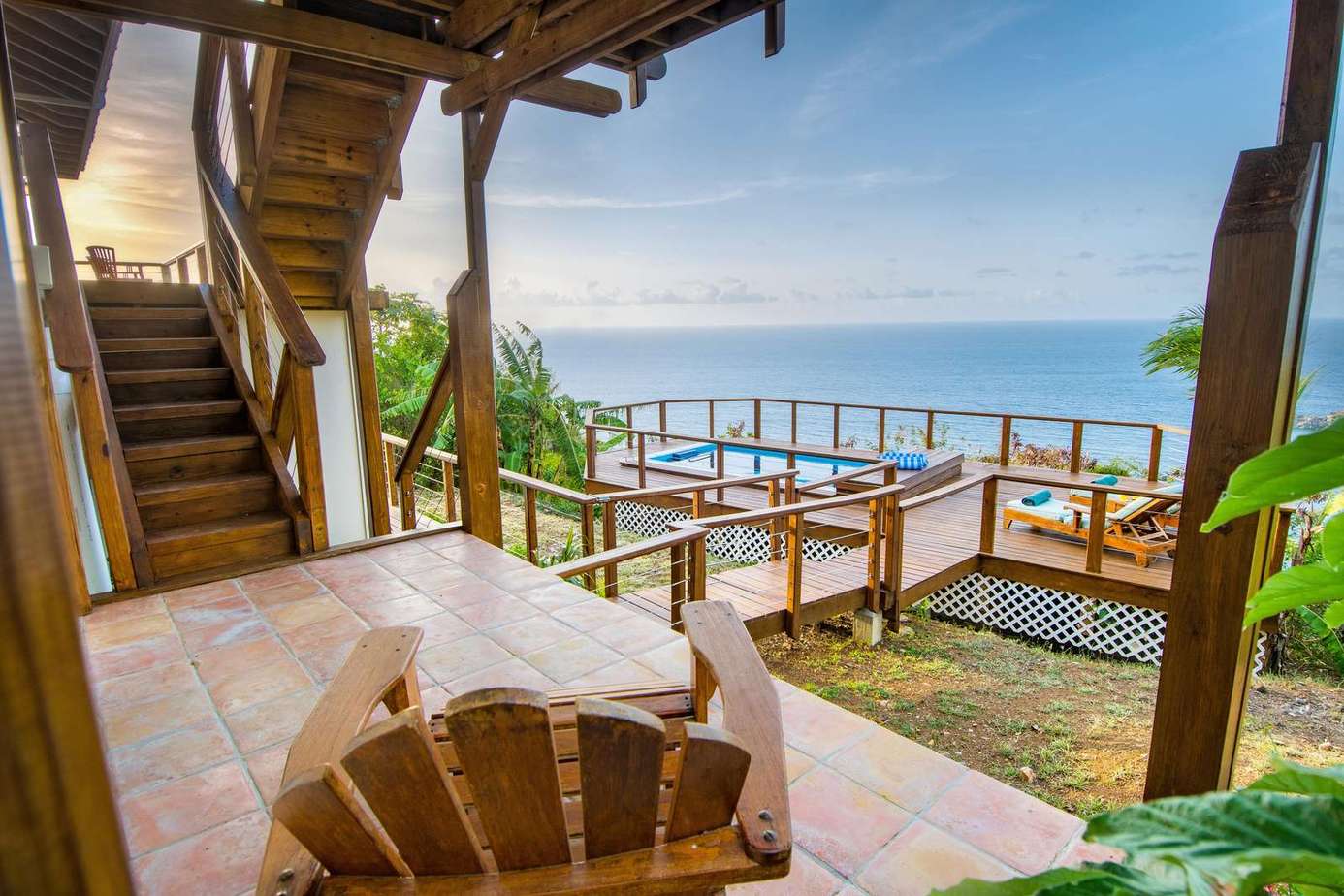 Oceanfront patio with cozy seating and stunning views