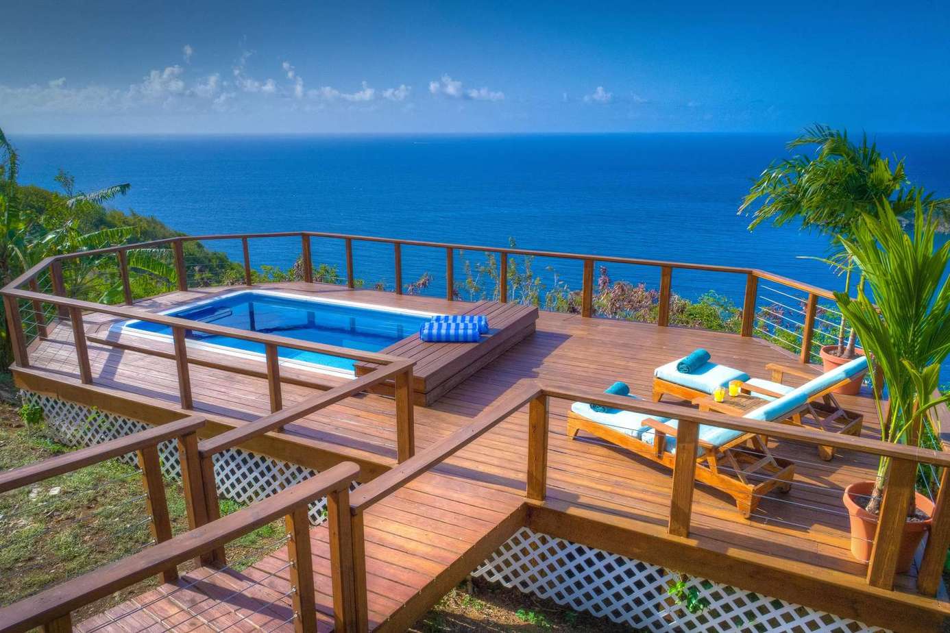 Ocean-view deck with private pool and sun loungers