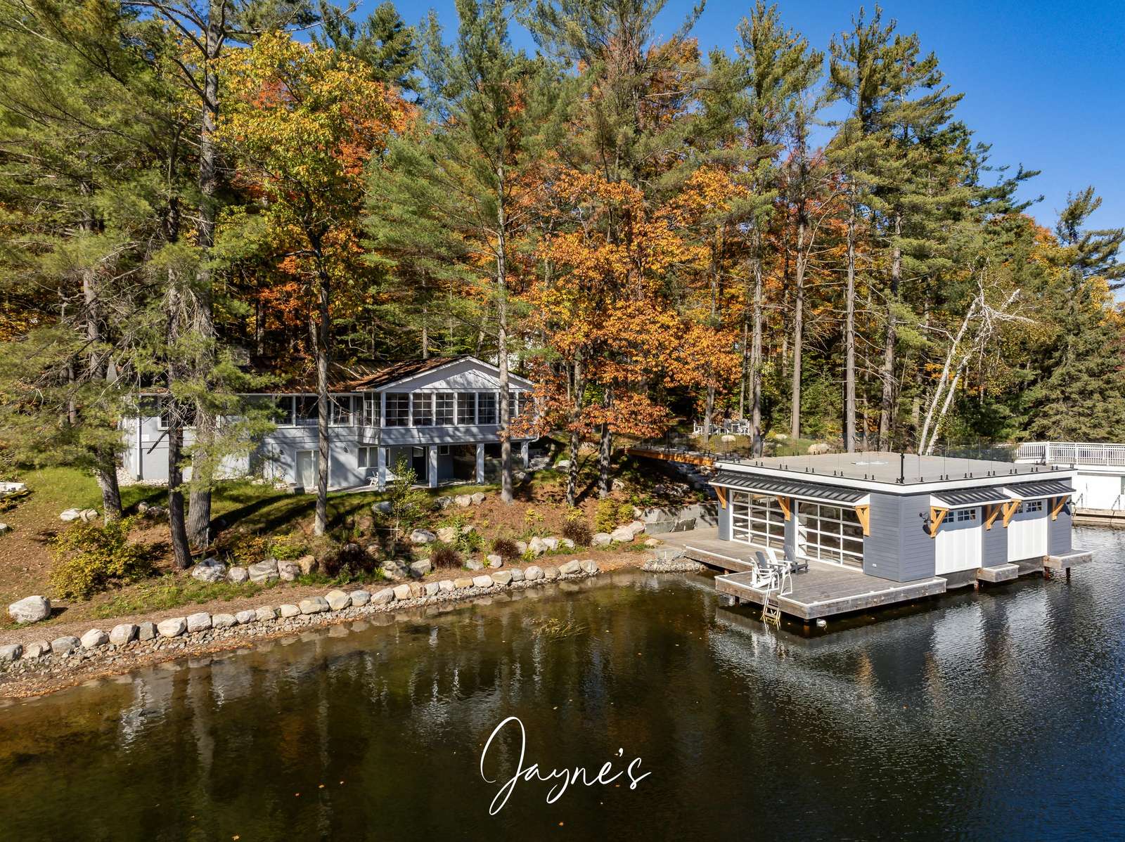 Lakeside retreat with private dock and serene forest views - property